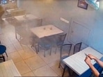 A CCTV grab shows a man firing inside the restaurant at Bhai Randhir Singh (BRS) Nagar, in Ludhiana on Wednesday. (HT photo)