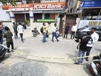 Police sealed the crime scene in Gomti Nagar where the woman banker was allegedly killed by her husband. (Deepak Gupta/HT Photo)