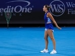 Aryna Sabalenka tosses her racket as she reacts to returning a shot against Sara Bejlek (CZE) during the Cincinnati Open at Lindner Family Tennis Center