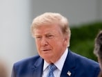 US President Donald Trump arrives for a Fostering the Future event in the Rose Garden of the White House in Washington, DC.