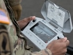 A U.S. Army servicemember using a small unmanned aircrafts system, or sUAS, controller.