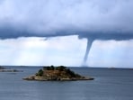 Videos appearing to show a possible waterspout or tornado have gone viral on social media.