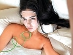 Kylie Jenner with wired earphones. Their sales are rising again after years of decline