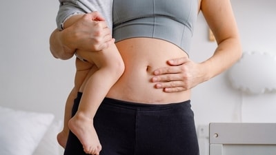 Beyond back pain: Why postpartum recovery must include the pelvic floor? (Shutterstock) Beyond back pain: Why postpartum recovery must include the pelvic floor? (Shutterstock)