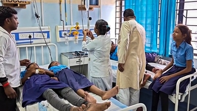 Nalanda: Students receive medical treatment at a hospital after allegedly consuming a midday meal at a government school in Bihar's Nalanda district (PTI) Nalanda: Students receive medical treatment at a hospital after allegedly consuming a midday meal at a government school in Bihar's Nalanda district (PTI)