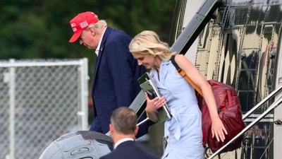 Before her stint in the White House, Harp worked as an anchor on right-wing news channel One America Network and later joined Trump's campaign in 2022. (AFP)