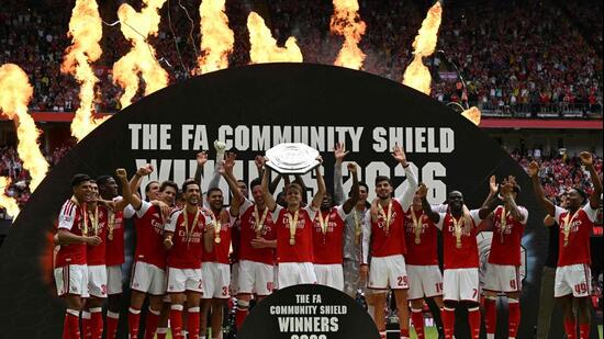 Arsenal players celebrate winning the English FA Community Shield match against Manchester City. (AFP)