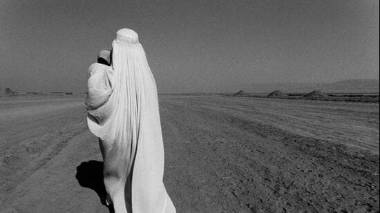 Khwaja Bahauddin. Takhar Province. November 2000 The burqa had long been traditional for women in Afghanistan before the arrival of the Taliban. (Seamus Murphy)