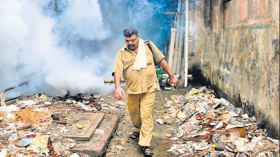 Mumbai...6th June 2011... News... Sanjay Jadhav, 46, a BMC worker fumigating the area with his TF35 Fogging Machine in the Aai Maai Merwanjee Lane in Parel area as a part of precautionary measures against Malaria during the monsoons - Photo by Kalpak Pathak (Hindustan Times)