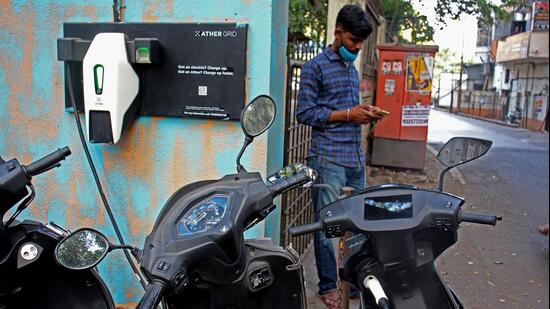 Pune, India - Dec. 26, 2021: EV Charging point installed out side a cafe off FC road (Dheeraj Bengrut story) in Pune, India, on Sunday, December 26, 2021. (Photo by Ravindra Joshi/HT PHOTO)