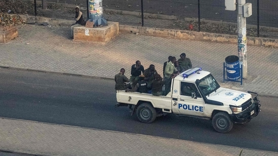 Security forces raided opposition leader Brian Mundubile’s home last week after the presidential vote. (AFP Photo)