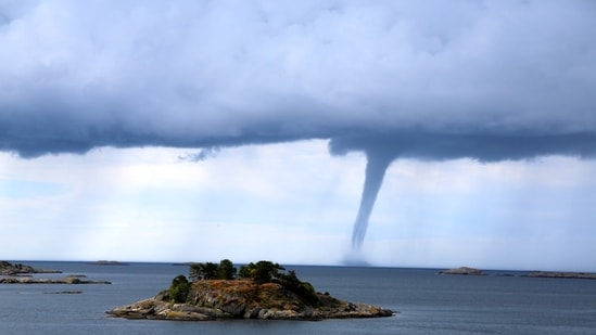 Videos appearing to show a possible waterspout or tornado have gone viral on social media.