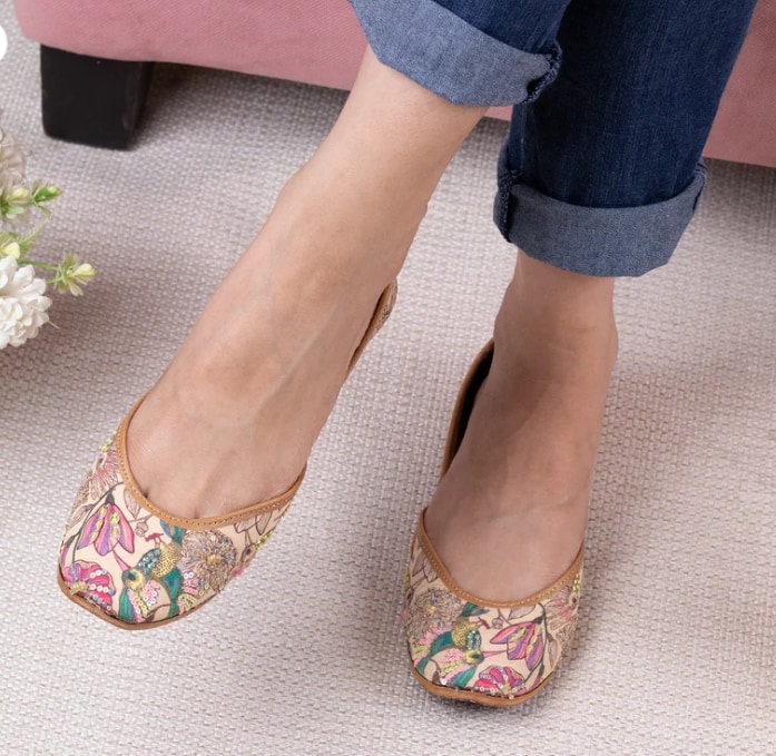 Wink features a beige base with floral and bird prints, along with hand-embroidered sequins and beadwork. (Coral Haze) Wink features a beige base with floral and bird prints, along with hand-embroidered sequins and beadwork. (Coral Haze)