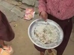 A clip from a video that went viral shows the food being served at Primary School Kotra in Tadiyawan development block of Hardoi. (Sourced)