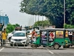 A road near the bus stand blocked by protesters; supporters of Qaumi Insaaf Morcha placing a barricade on the Jalandhar highway near Ladhowal police station. (HT)
