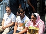 Lok Sabha LoP Rahul Gandhi, along with Sahil and his mother, remain outside the DCP Office, Parliament Street Police Station, in New Delhi.