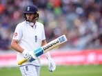 Joe Root walks off after losing his wicket to the bowling of Khurram Shahzad.