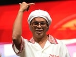 Brazil soccer star Ronaldinho greets fans as he is introduced during his official presentation for Serie C soccer club Ravenna FC.