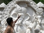 Gram it: Weeks ahead of the Ganesh Chaturthi festival, a 25-year-old artist Ram Babu from Barmer district in Rajasthan works on a 12-foot-tall idol of Lord Ganesha, on Old MG Road near Government Girls College in Gurugram. Delhiites are waiting for the festival to arrive!(Photo: Parveen Kumar/Hindustan Times)