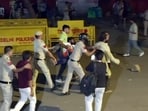 Police detain a protester during a protest against caste-based reservation at Jantar Mantar, in New Delhi on Friday(ANI Video Grab)