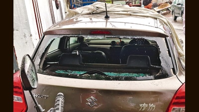 The Thursday evening attack at Jatta village in Amritsar’s Ajnala sub-division also left the house and a car damaged. (HT) The Thursday evening attack at Jatta village in Amritsar’s Ajnala sub-division also left the house and a car damaged. (HT)