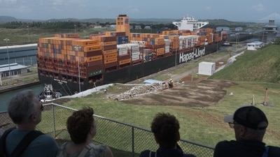A container ship navigates the Agua Clara locks of the Panama Canal. (Bloomberg)