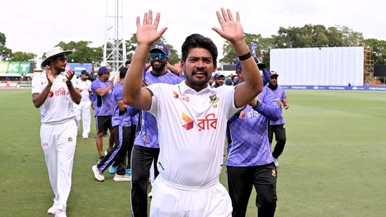 Bangladesh captain Najmul Hossain Shanto waves to the fans after his team's victory in the first Test.