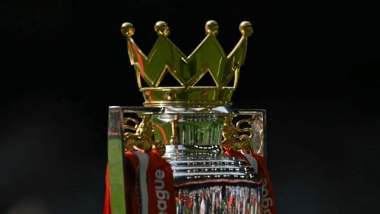 Arsenal's Premier League trophy, on display pitch-side ahead of the English FA Community Shield football match between Arsenal and Manchester City at The Principality Stadium, in Cardiff, south Wales on August 16, 2026. (AFP)