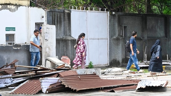 Structures, including queue liners near the visa section of the Pakistan High Commission, reportedly located outside the compound’s designated perimeter in a lane, were removed by authorities at New Delhi on Thursday (HT photo)