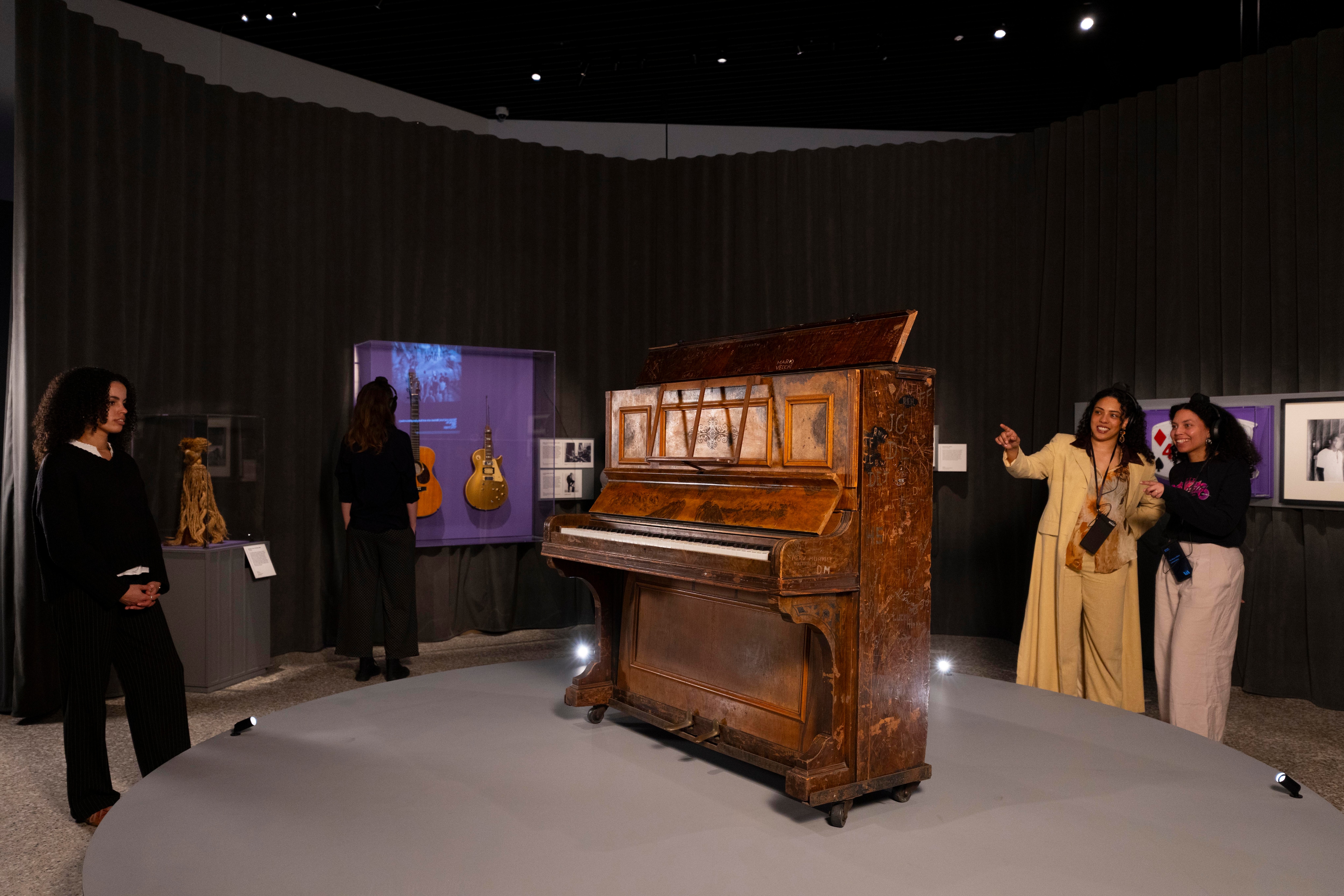 A piano that belonged to Winifred Atwell, the first Black artist to score a UK #1 hit, in 1953. It is on display as part of the exhibition Music is Black: A British Story. (Image courtesy David Parry / V&A)