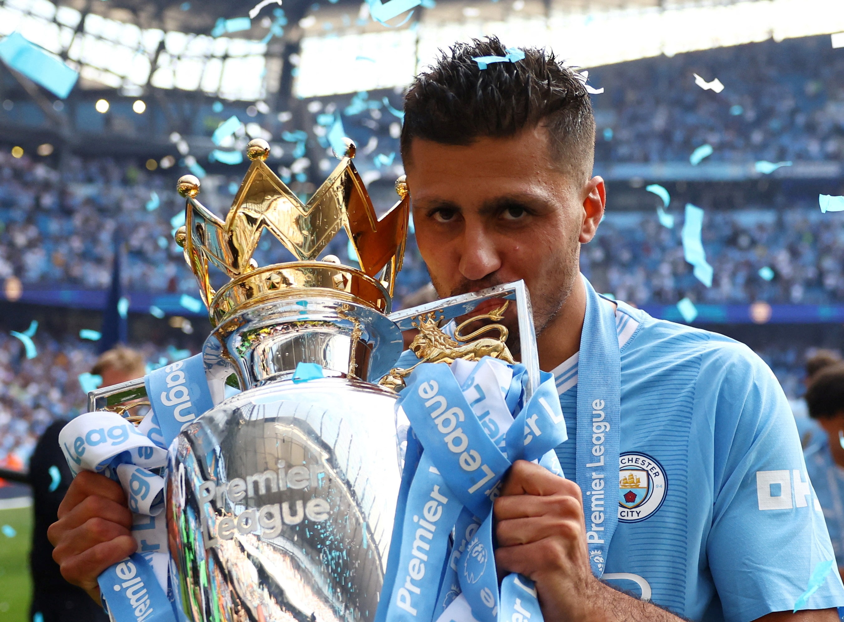 Manchester City’s Rodri celebrates with the Premier League trophy at Etihad Stadium on May 19, 2024. (Action Images via Reuters)