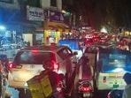 A traffic jam on Meerabai Marg in Lucknow on Friday evening after heavy rain. (HT Photo)