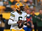 Tyrod Taylor of the Green Bay Packers is facing flak during the game against Denver Broncos.