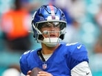 New York Giants quarterback Jaxson Dart warms up prior to the preseason game against the Miami Dolphins.