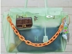 While a real Hermès Birkin costs anywhere from <span class='webrupee'>₹</span>8 lakh to over <span class='webrupee'>₹</span>25 lakh with a years-long waitlist, these plastic versions retail for a budget-friendly <span class='webrupee'>₹</span>1,500 to <span class='webrupee'>₹</span>4,800 on local e-commerce sites and Instagram stores.(Photo: Instagram)