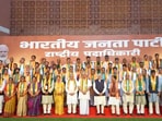 PM Modi and Nitin Nabin can be seen posing with the entire team of office-bearers who were recently named to various posts.