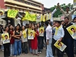 Supporters of Himachal Pradesh Students Union campaigning at DAV College, Chandigarh, on Friday. (Ravi Kumar/HT)