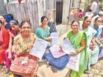 Women gathered to collect documents and certificates at Thane tahshil office for 'Ladki Bahin' scheme.