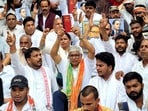 UP Congress workers led by Rajendra Pal Gautam (AICC in-charge for UP Congress) and Dr. Anil Jaihind (president of the Backward Classes Department)—staged a sit-in at the State Congress headquarters in front of the statue of Mahatma Gandhi in Lucknow on Friday. (HT Photo)