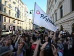 Supporters of Yabloko gather outside a Moscow courthouse during a hearing on the party's election ban.