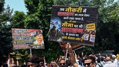 Protesters raise slogans as they participate in Reservation Hatao Andolan stir Protesters raise slogans as they participate in Reservation Hatao Andolan stir