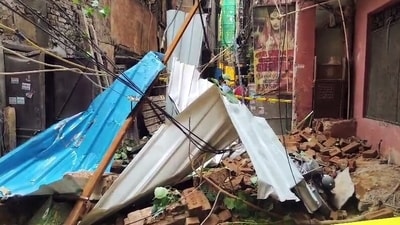 Debris lies in a narrow alley after the wall of an old building collapsed in the Karol Bagh area, in New Delhi on Friday. (ANI)