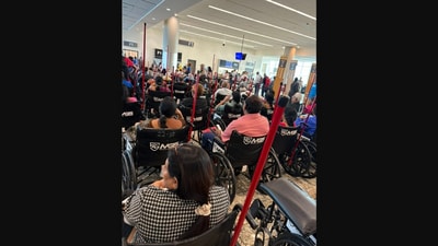 The viral airport picture that has divided the internet. (Screengrab (X))