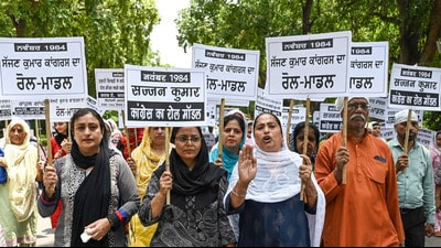 Members of the Delhi Sikh Gurdwara Management Committee and families of the 1984 anti-Sikh riots victims staging a protest outside Lok Sabha LoP Rahul Gandhi's residence at Sunehri Bagh Road in New Delhi on Saturday. (ANI photo) Members of the Delhi Sikh Gurdwara Management Committee and families of the 1984 anti-Sikh riots victims staging a protest outside Lok Sabha LoP Rahul Gandhi's residence at Sunehri Bagh Road in New Delhi on Saturday. (ANI photo)