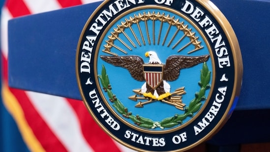 The Department of Defense seal is seen on the podium in the Press Briefing room at the Pentagon.