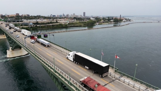Trucks and other vehicles cross the bridge at the U.S.-Canada border in Fort Erie, Ontario, this week.