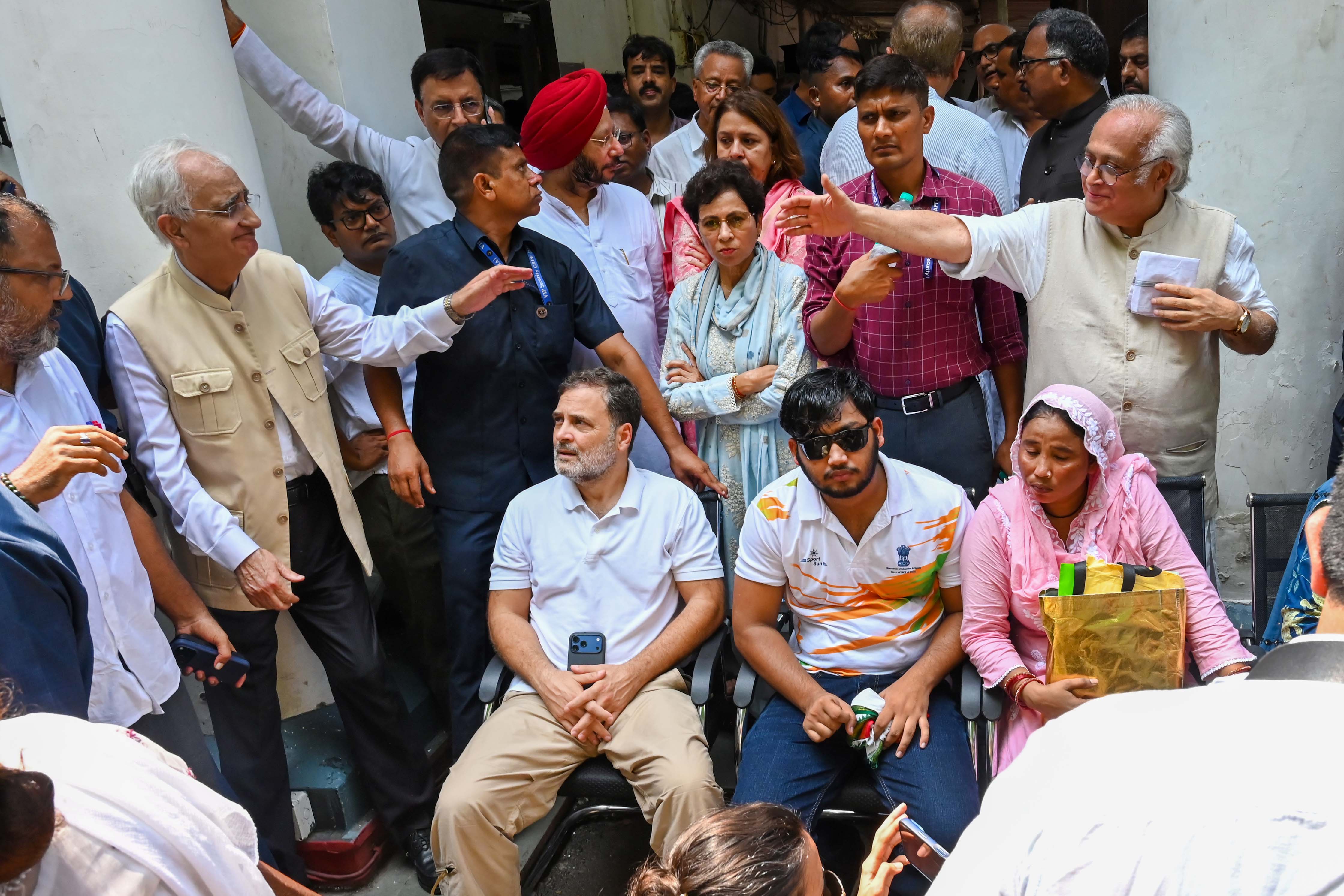 By noon, a sea of Congress leaders, members and supporters had gathered outside the police station. Among them were Priyanka Gandhi, Jairam Ramesh, Adhir Ranjan Chowdhury and others. (Vipin Kumar/HT Photo) By noon, a sea of Congress leaders, members and supporters had gathered outside the police station. Among them were Priyanka Gandhi, Jairam Ramesh, Adhir Ranjan Chowdhury and others. (Vipin Kumar/HT Photo)
