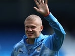 Manchester City's Norwegian striker #09 Erling Haaland, sporting a new hair cut, warms up ahead of the English Premier League football match between Manchester City and AFC Bournemouth at the Etihad Stadium in Manchester, north west England.(AFP)