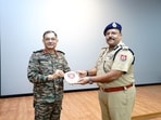 Lt Gen Pushpendra Singh, General Officer Commanding-in-Chief, Western Command, with Praveen Sinha, special DGP, law and order, Punjab. (HT)