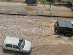 Tulip Chowk, Sector 10, Airia Mall, Hero Honda Chowk and other stretches remained waterlogged, with some roads reporting knee-deep water. (Parveen Kumar/HT)